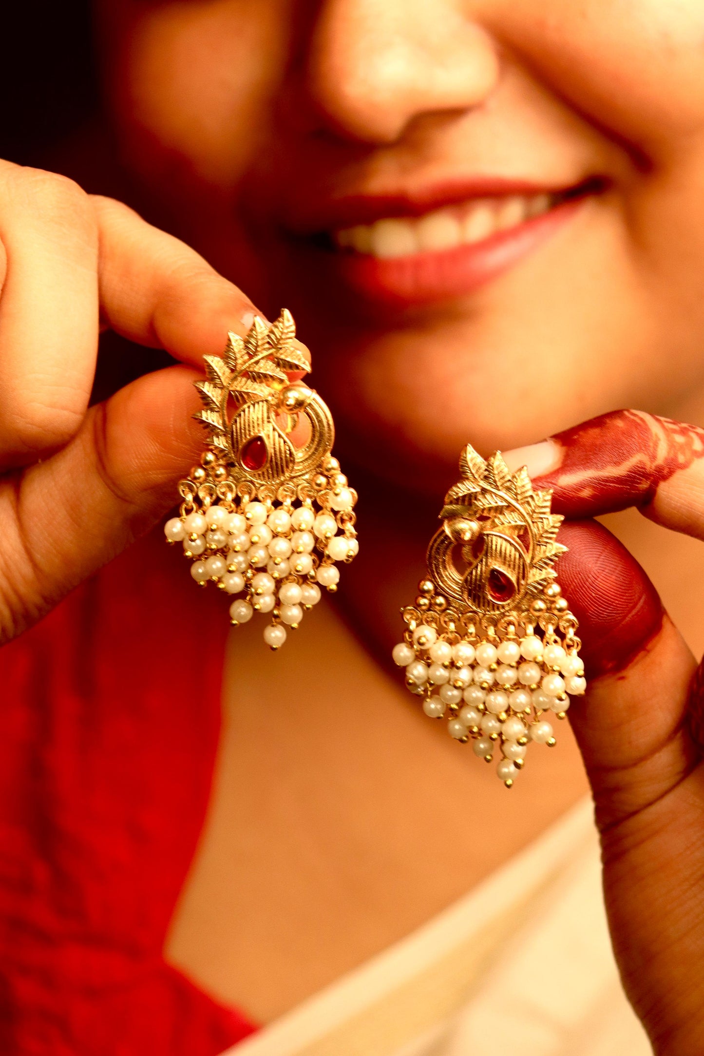 Peacock pearl earring